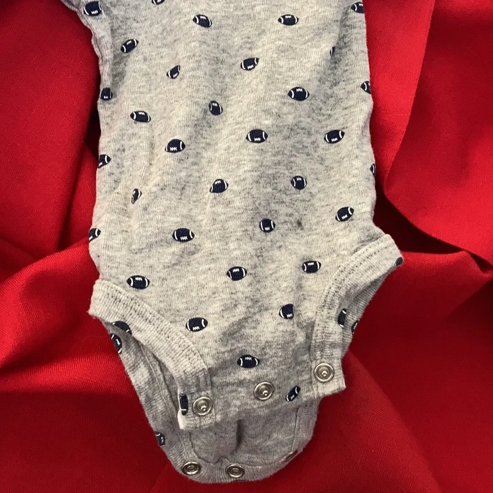 Carter’s newborn football one piece
